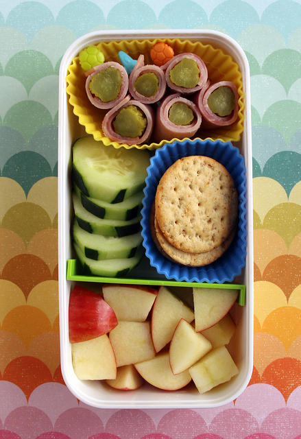 Wrap ham slices around pickles, cut into chunks and secure with a cute pick.