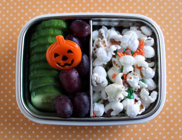 Popcorn, cukes and grapes snack