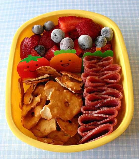 Berries, pretzel thins and salami for a preschooler