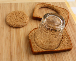 Cut a circle from bread using a drinking glass or a cookie cutter