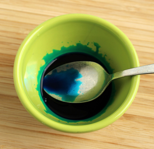 Add blue food coloring to a small amount of water.