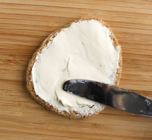 Spread the cream cheese in an even layer over the bread