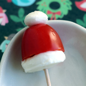 12 Ideas for Fun Christmas Lunches - tomato and cheese Santa hat