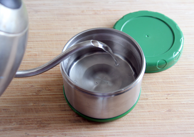 The key to keeping food you send off in a thermos hot all day is to fill it with boiling water for a few minutes before you add the hot food.